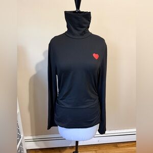 Black turtleneck with heart on chest—  new no tags.